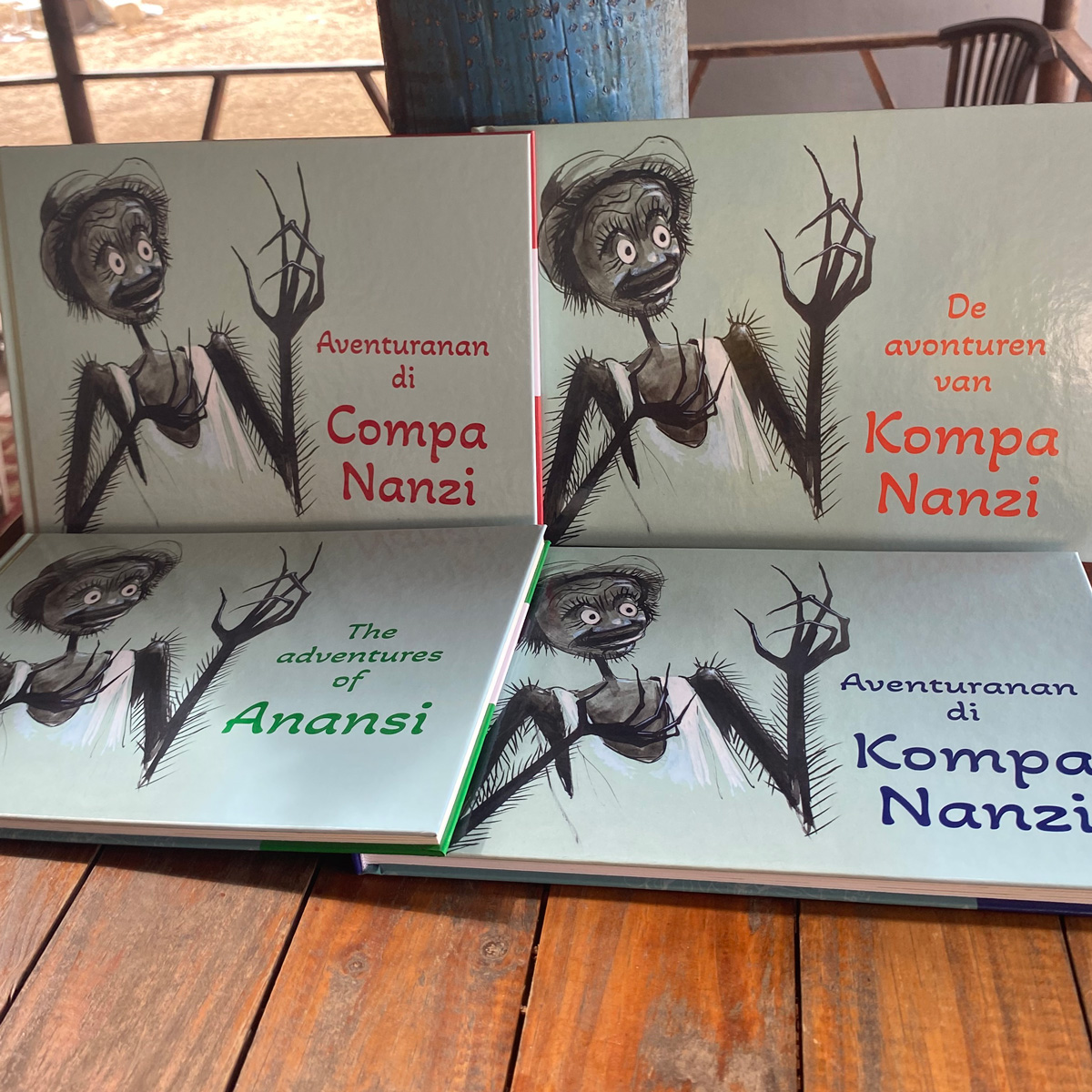 De boeken van Avonturen van Kompa Nanzi in 4 talen